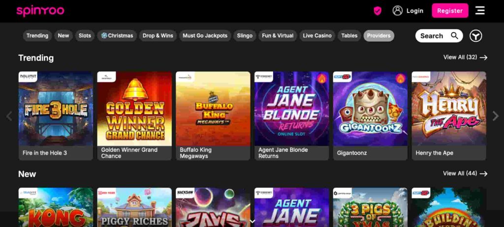 SpinYoo Casino lobby showing trending and new slot game tiles with titles like Fire in the Hole 3, Golden Winner Grand Chance, Buffalo King Megaways, Gigantoonz and Henry the Ape, plus navigation categories across the top.